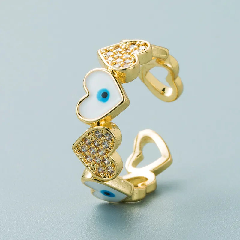 OJOS Y CORAZONES GOLD PLATED RING